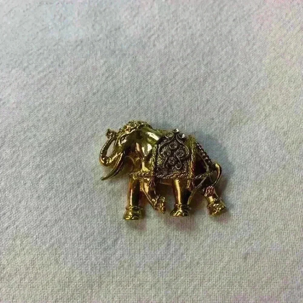 Vintage elephant, brooch, gold with bezel set rhinestones